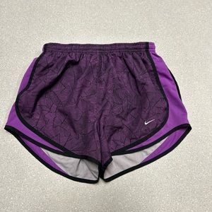Nike women’s dri-fit purple size medium running shorts